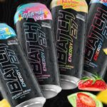 Fyra burkar av Batch 27 energidryck med fruktsmaker.