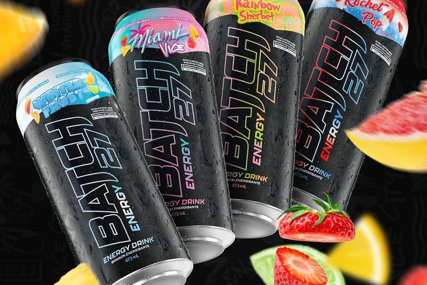 Fyra burkar av Batch 27 energidryck med fruktsmaker.